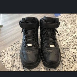 Black high top nike air force ones
